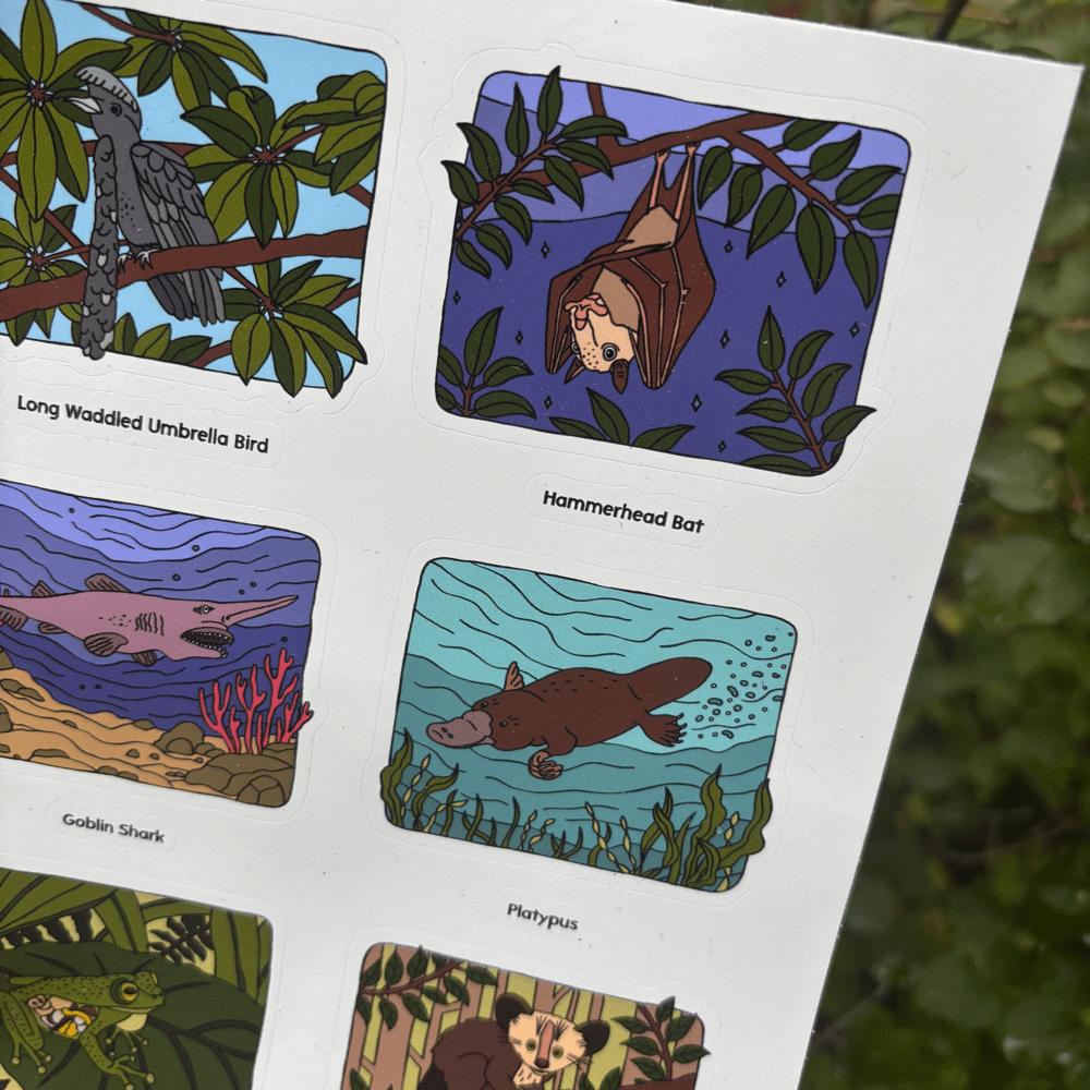 sticker sheet with illustrations of strange animals on a white background