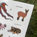 Sheet of illustrated animal stickers with Chinese Water Deer and Lowland Streaked Tenrec on a white background.