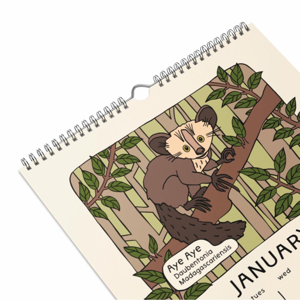 Calendar with a drawing of an aye aye on a tree branch, featuring the month of January.